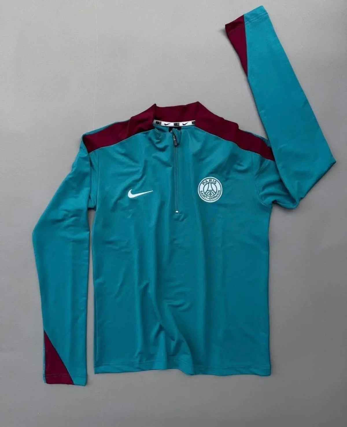 Paris football zipper drill top