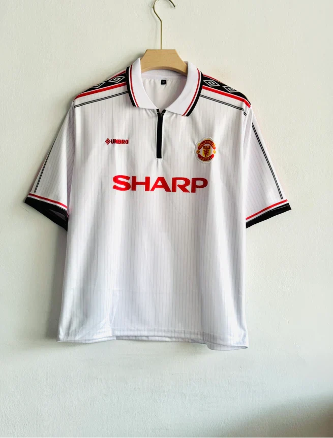 MANCHESTER UNITED 1998-99 THIRD KIT BECKHAM FIVESLEEVE POLO PRINTED WITH ZIP